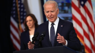 U.S. President Joe Biden (R) delivers remarks with Vice President Kamala